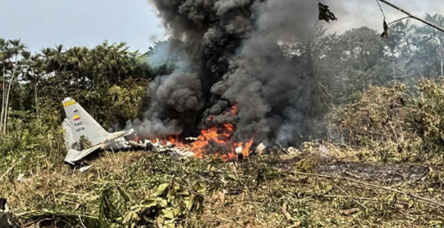 The crashed Colombian miiitary plane in flames