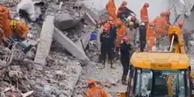 The scene of a building collapse in South Delhi.