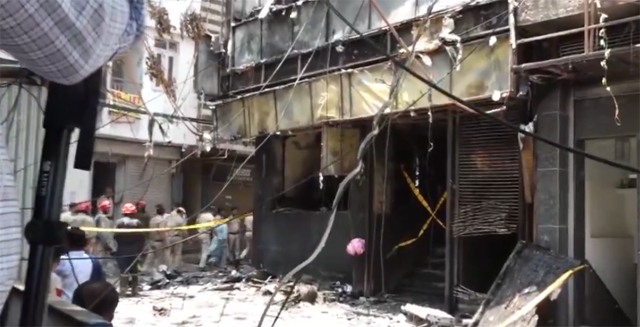 A hotel devastated by fire.